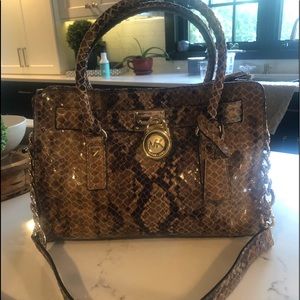 Michael Kors Alligator pocketbook.